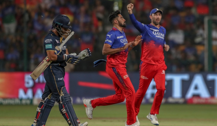 Mohammed Siraj and Glenn Maxwell ap photo